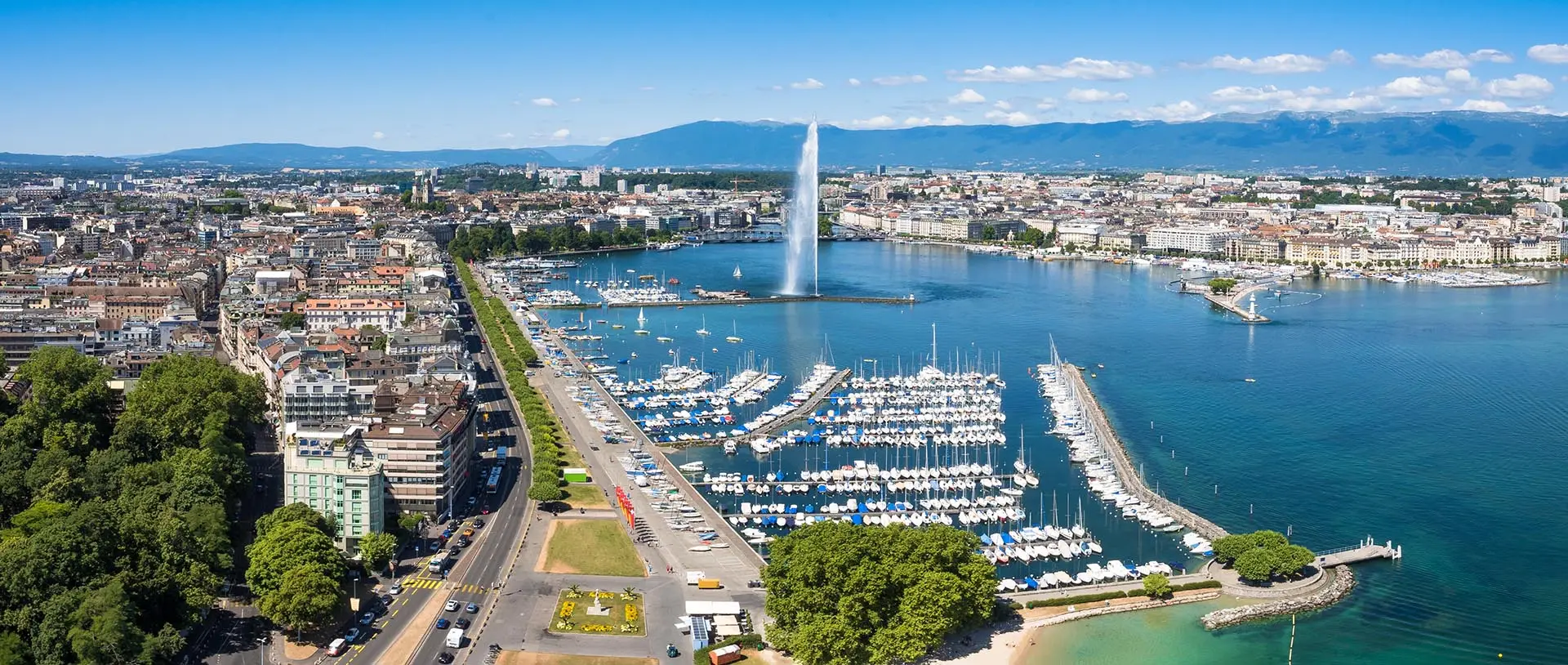 Vue aérienne de la rade de Genève, symbole de la présence locale et de l’engagement de Dynamiz en conseil et formation à Genève et en Suisse romande.
